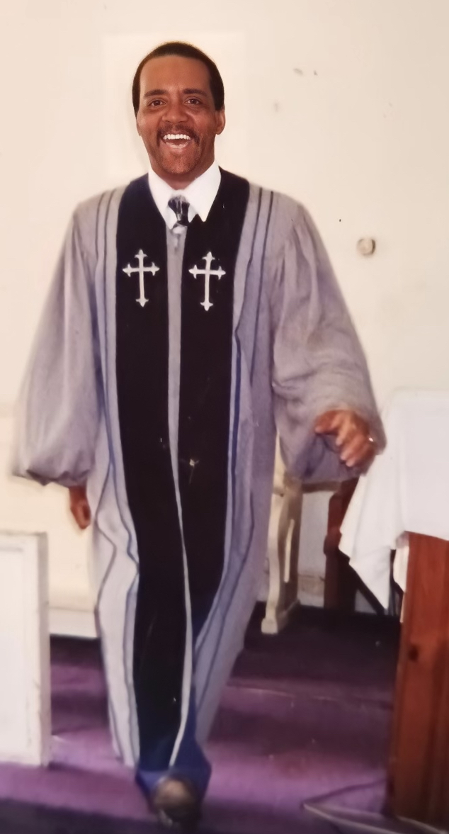 Pastor Archie McHerring in his pastoral robe